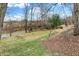 Spacious backyard with a river view and a playset for outdoor enjoyment at 207 E Ohio St, Mooresville, IN 46158