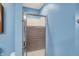 Bathroom stall with striped door at 207 E Ohio St, Mooresville, IN 46158