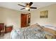 Bedroom featuring a double bed, dresser, and ceiling fan at 207 E Ohio St, Mooresville, IN 46158