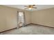 Empty bedroom featuring a ceiling fan and a window at 207 E Ohio St, Mooresville, IN 46158