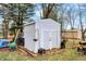 A durable, neutral-colored storage shed with double doors provides ample space at 207 E Ohio St, Mooresville, IN 46158