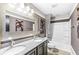 Bathroom featuring a double vanity with granite countertops, shower, and tub at 209 North Bnd, Greenwood, IN 46142