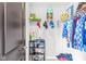 Well-organized closet with shelving, hanging clothes, and hats on display at 209 North Bnd, Greenwood, IN 46142