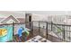 Second floor hallway featuring railings and an open view of the main floor at 209 North Bnd, Greenwood, IN 46142