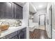Hallway with dark cabinets, backsplash and bench seating at 209 North Bnd, Greenwood, IN 46142