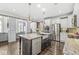 Bright, open kitchen featuring a large island, stainless steel appliances, and modern finishes at 209 North Bnd, Greenwood, IN 46142