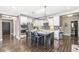 Modern kitchen with stainless steel appliances, granite countertops and a large island at 209 North Bnd, Greenwood, IN 46142