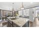 Modern kitchen island with granite countertops and stainless steel appliances at 209 North Bnd, Greenwood, IN 46142