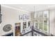 Bright and airy living room with soaring ceilings, large windows, and stylish decor at 209 North Bnd, Greenwood, IN 46142