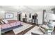 Spacious main bedroom featuring hardwood floors, a tray ceiling and two sitting areas at 209 North Bnd, Greenwood, IN 46142
