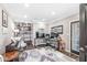 Spacious home office with custom built-ins, hardwood floors, and a comfortable workspace at 209 North Bnd, Greenwood, IN 46142