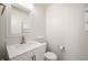 Bathroom featuring a white vanity with marble countertops and a decorative mirror at 2324 Boneset Dr, Plainfield, IN 46168
