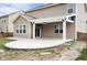 Covered patio with an outdoor ceiling fan and attached TV provides great entertainment space at 2324 Boneset Dr, Plainfield, IN 46168