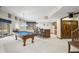 Finished basement with a pool table, wet bar, and walkout to a patio perfect for entertaining at 2437 W Wavelyn N Cir, Martinsville, IN 46151