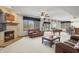 Finished basement with a fireplace, a pool table, and leather couches at 2437 W Wavelyn N Cir, Martinsville, IN 46151
