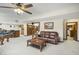 Finished basement with a couch, pool table, and wet bar at 2437 W Wavelyn N Cir, Martinsville, IN 46151