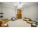 Spacious bedroom with ceiling fan, shelving, and hardwood floors at 2437 W Wavelyn N Cir, Martinsville, IN 46151