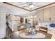 Open-concept kitchen with granite countertops, a kitchen island and stainless appliances at 2437 W Wavelyn N Cir, Martinsville, IN 46151