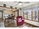 Cozy living area with connecting dining, kitchen, and a view of the lake at 2437 W Wavelyn N Cir, Martinsville, IN 46151