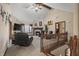 Inviting living room with high ceilings, fireplace, and large windows providing ample natural light at 2437 W Wavelyn N Cir, Martinsville, IN 46151