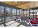 Spacious screened porch provides a beautiful view of the surrounding area and the tranquil lake at 2437 W Wavelyn N Cir, Martinsville, IN 46151