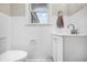 Cozy bathroom featuring white tile and a stylish vanity at 3013 E 7Th St, Anderson, IN 46012