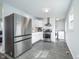 Modern kitchen featuring stainless steel appliances and gray flooring at 3045 N Lasalle St, Indianapolis, IN 46218