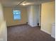 Cozy bedroom features a window and closet for ample storage at 318 Tague St, Greenfield, IN 46140