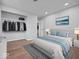 A well-staged bedroom with a cozy bed, modern decor, and ample closet space at 329 Roosevelt Dr, Shelbyville, IN 46176