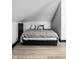 Cozy attic bedroom with vaulted ceilings, neutral decor, and storage, for comfort and convenience at 425 E Walnut St, Indianapolis, IN 46202