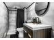 Modern bathroom with stylish vanity, gray tile shower, and contemporary fixtures at 425 E Walnut St, Indianapolis, IN 46202