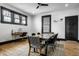 Bright dining room with a modern table, stylish chairs, and natural light at 425 E Walnut St, Indianapolis, IN 46202