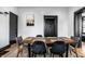 Modern dining area with a wooden table, stylish chairs, and elegant decor at 425 E Walnut St, Indianapolis, IN 46202