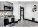 Well-equipped kitchen with stainless steel appliances and modern finishes at 425 E Walnut St, Indianapolis, IN 46202