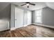 Attic bedroom featuring hardwood floors, neutral walls, two closets and a dormer window at 4610 W 72Nd St, Indianapolis, IN 46268