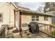 Outdoor deck featuring a grill, gas grill, and exterior access to the home at 4610 W 72Nd St, Indianapolis, IN 46268