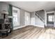 Bright entryway with hardwood floors, fresh paint and stairs, showing a clean and welcoming space at 4610 W 72Nd St, Indianapolis, IN 46268