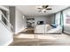 Bright living room features wood floors, neutral walls, and an open floor plan to the kitchen at 4610 W 72Nd St, Indianapolis, IN 46268