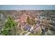 An aerial view captures the home nestled within a lush, tree-filled neighborhood at 5937 Guilford Ave, Indianapolis, IN 46220