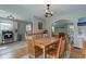 Open-concept dining room connecting the living room and kitchen, offering a modern and versatile space at 5937 Guilford Ave, Indianapolis, IN 46220