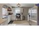 Bright kitchen featuring modern appliances, white cabinetry, and quartz countertops at 5937 Guilford Ave, Indianapolis, IN 46220