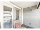 Enclosed balcony featuring a neutral color palette, privacy shades, and wood paneling at 6231 Amber Creek Ln, Indianapolis, IN 46237