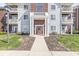 Welcoming building entrance with classic architectural details and a well-maintained walkway at 6231 Amber Creek Ln, Indianapolis, IN 46237