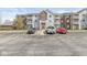 Spacious building with assigned parking and classic architectural details and a well-maintained walkway at 6231 Amber Creek Ln, Indianapolis, IN 46237