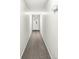 Clean, well-lit hallway with neutral colors and durable carpeting, creating a welcoming path at 6231 Amber Creek Ln, Indianapolis, IN 46237