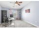 Home office featuring a ceiling fan, and a large window for natural light at 6231 Amber Creek Ln, Indianapolis, IN 46237
