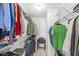 Functional walk-in closet with ample storage space including shelving and hanging racks at 6231 Amber Creek Ln, Indianapolis, IN 46237