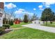 Spacious backyard with a large shed and 3-car garage with gravel drive at 6611 Valley Mills Ave, Indianapolis, IN 46241