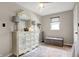 Bedroom with a ceiling fan, carpet, and a dresser with a decorative mirror at 6611 Valley Mills Ave, Indianapolis, IN 46241