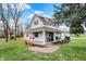 Inviting home with a spacious covered porch, swing, red shutters, and well-kept lawn, blending comfort with classic charm at 6611 Valley Mills Ave, Indianapolis, IN 46241